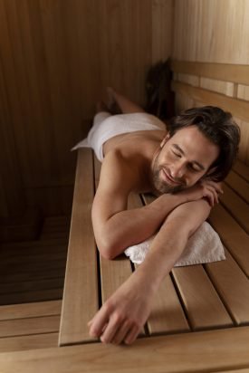 close-up-man-relaxing-sauna